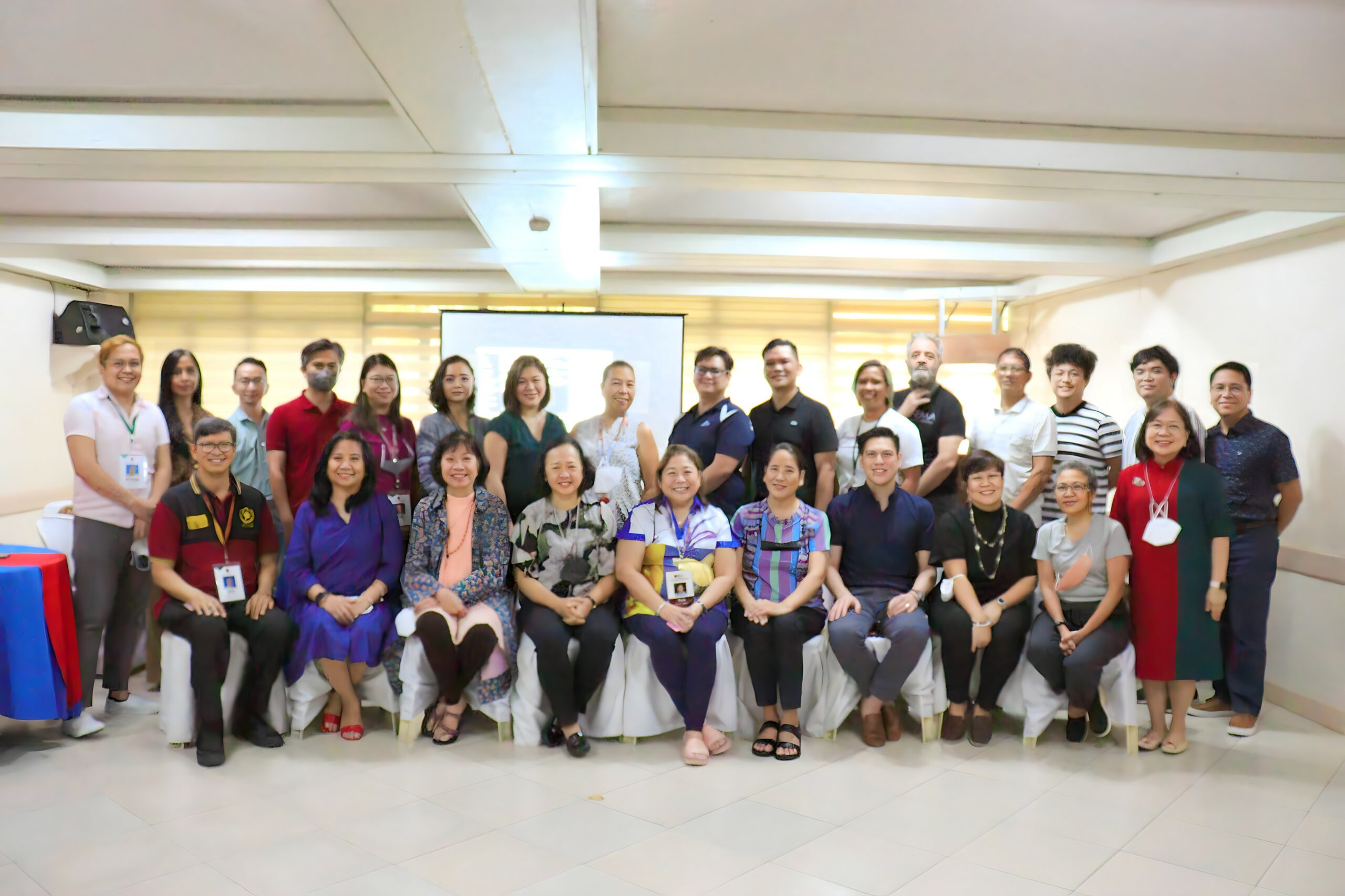 Photo opportunity of UP Diliman and UP System administrators, faculty and staff  after the post-assessment meeting