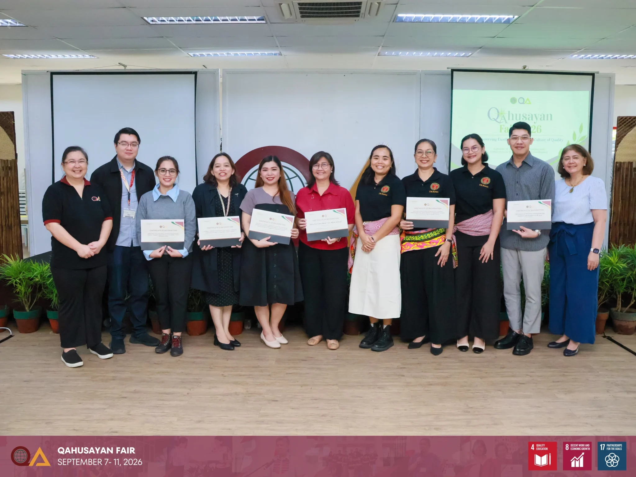 Vice Chancellor for Administration Adeline A. Pacia and UPD QAO Director presented Certificates of Recognition to representatives of poster presentations that received special citations.